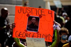 "Justice 4 George Floyd" protest sign