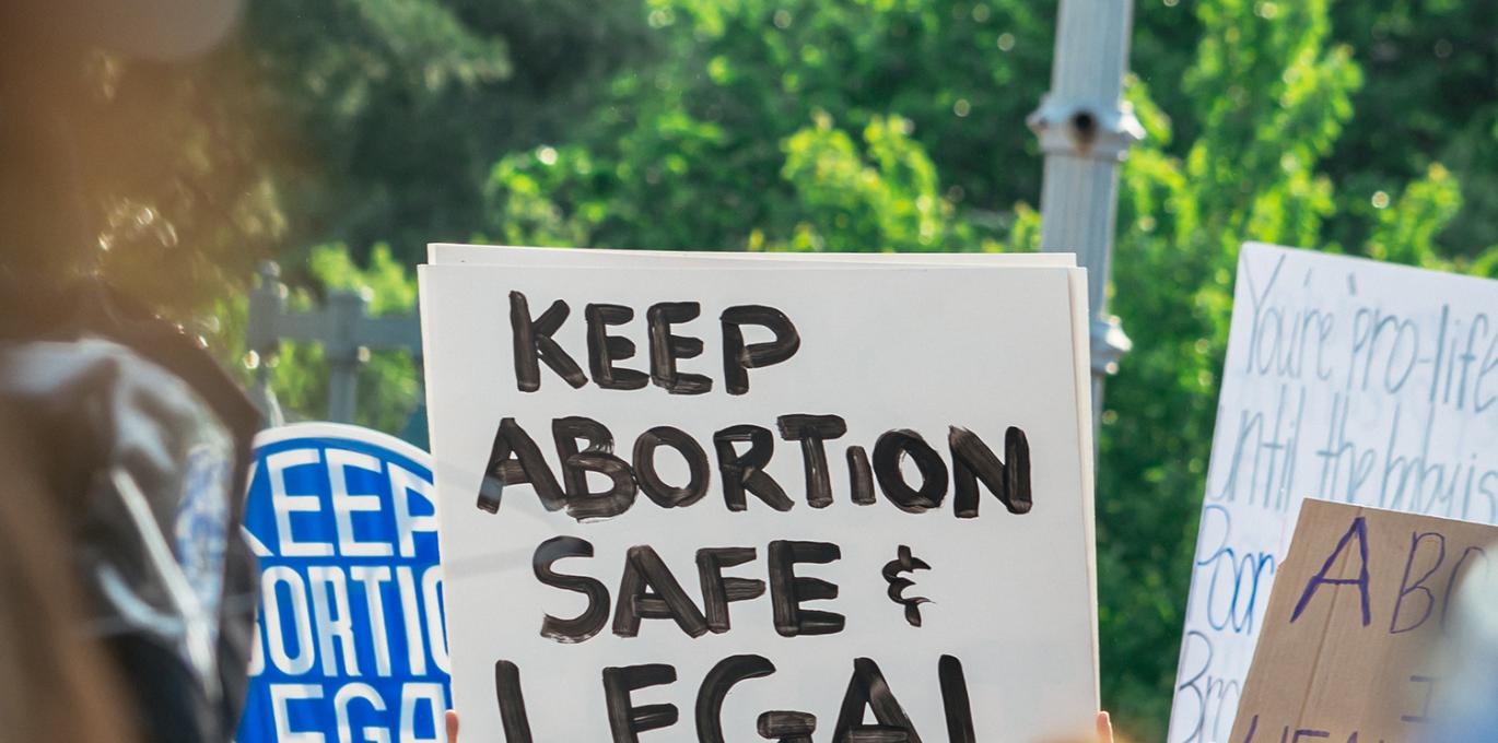 Placard stating "Keep Abortion Safe and Legal"