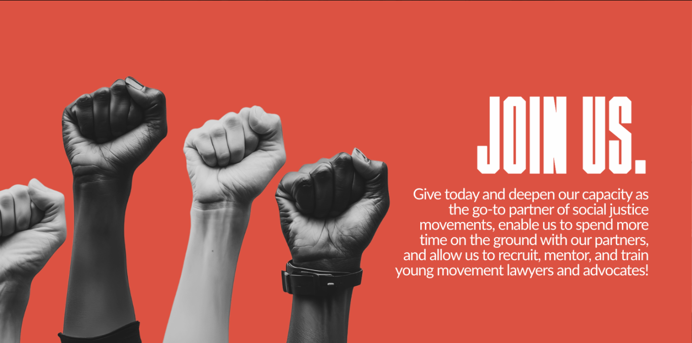 Four raised fists in solidarity