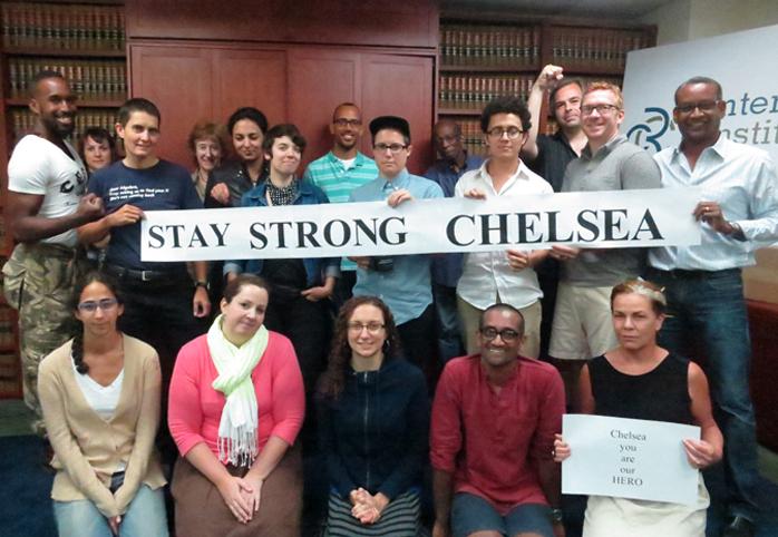 CCR staff holding a sign that reads "Stay Strong Chelsea"