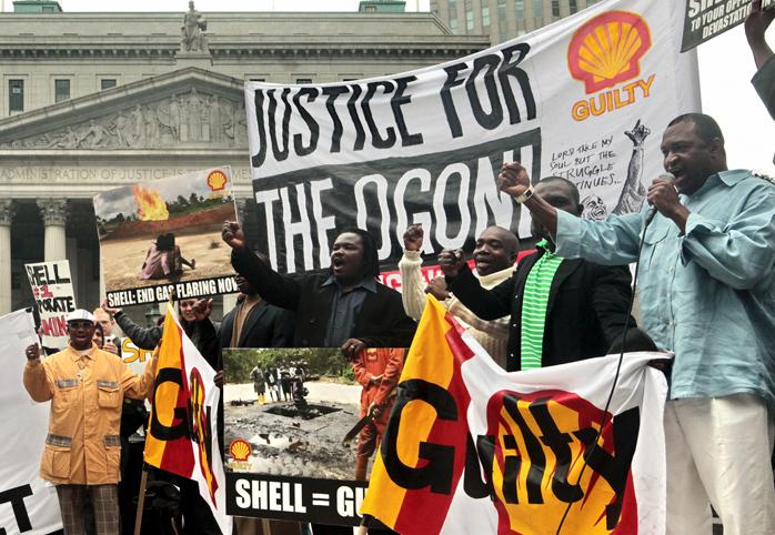 A protest in front of the U.S. Supreme Court, signs read "Justice for the Ogoni"