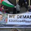 Rally with banner reading "We Demand Justice for Rasmea"