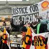 Nigerian Ogoni people protest Shell outside the U.S. Supreme Court