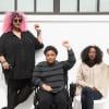 Black queer and trans disabled folks raise fists